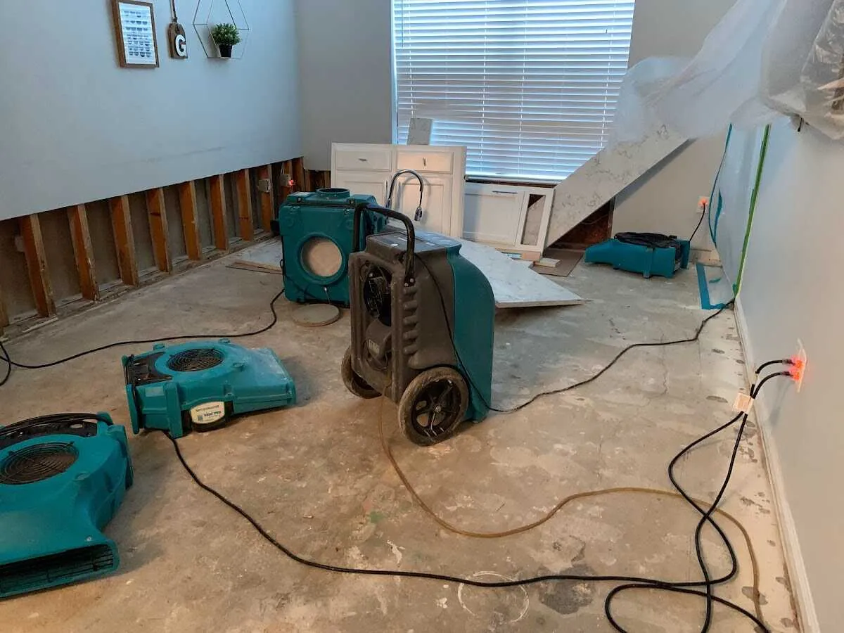 Dehumidifier in flood-cut room for Water Damage Restoration in Wisconsin Rapids